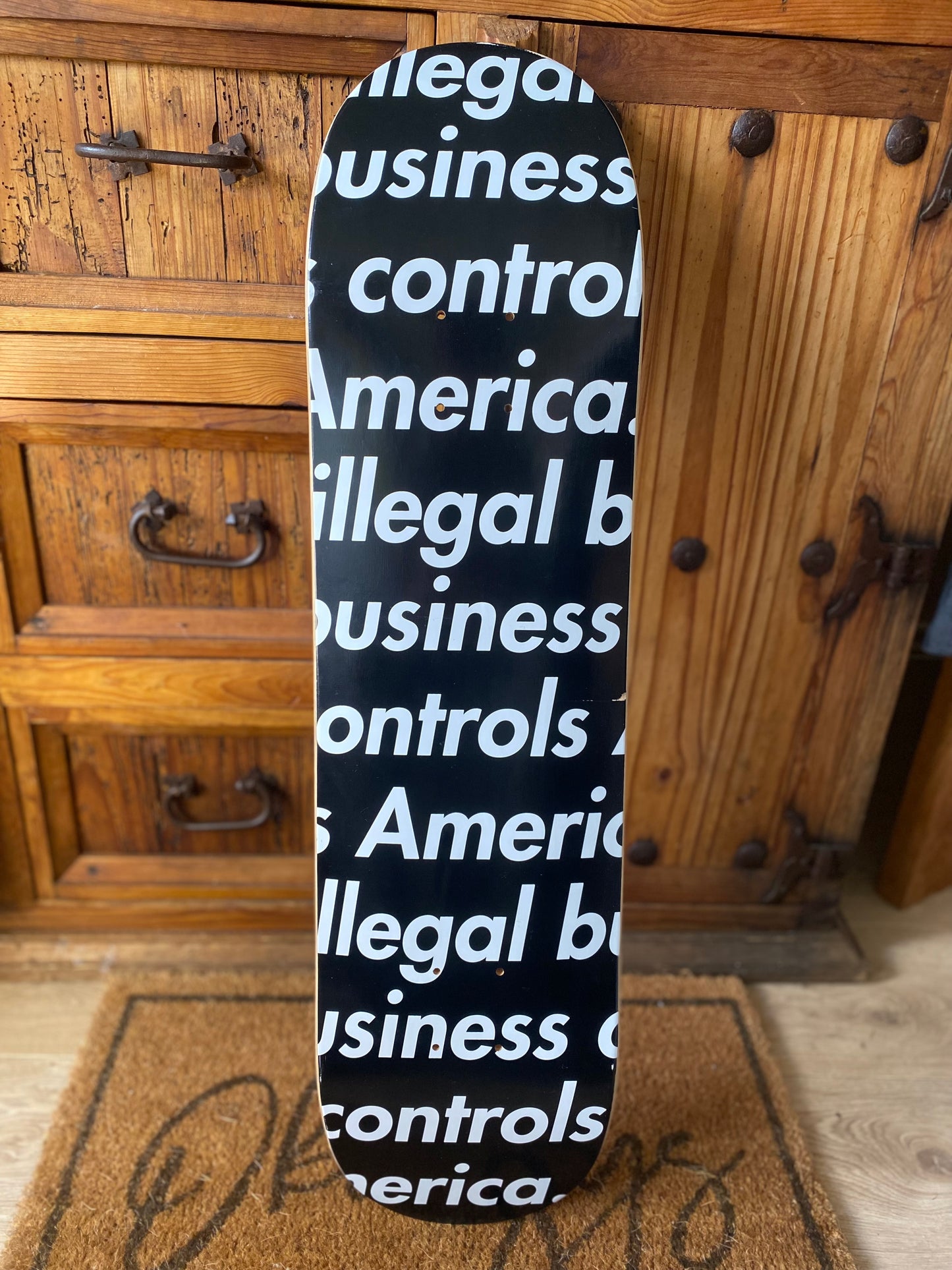 SUPREME ‘ILLEGAL BUSINESS CONTROLS AMERICA’ DECK