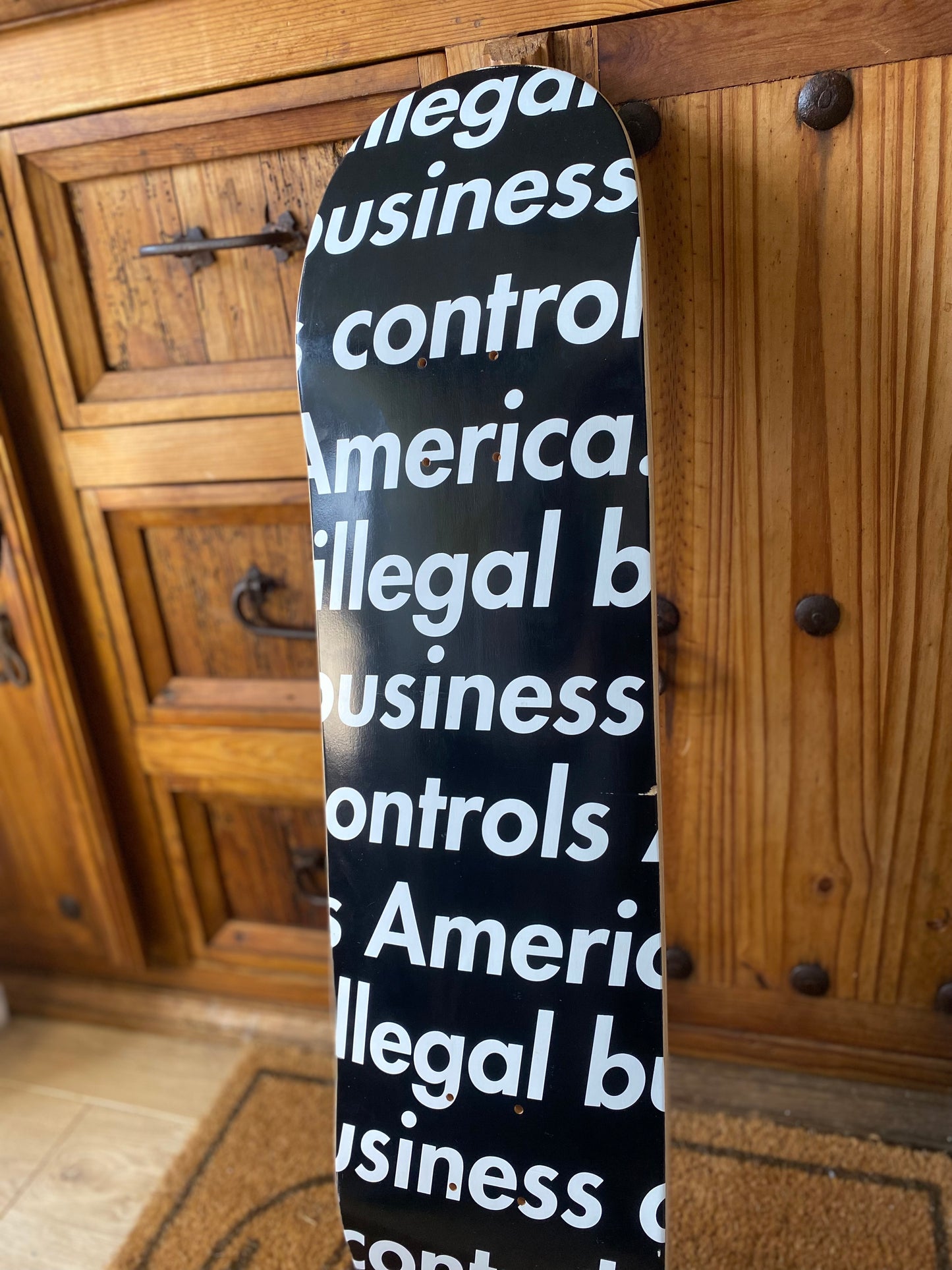 SUPREME ‘ILLEGAL BUSINESS CONTROLS AMERICA’ DECK
