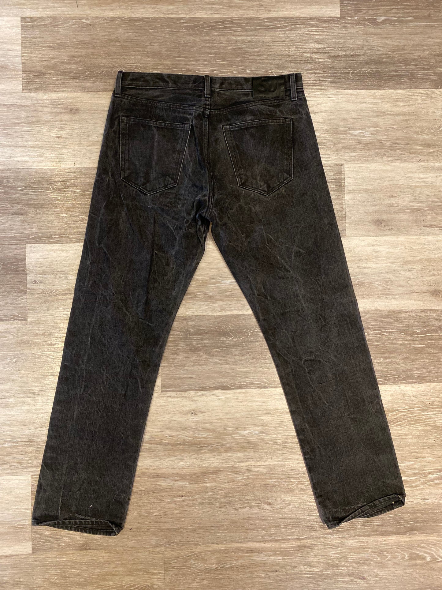 SUPREME STONE WASHED JEANS
