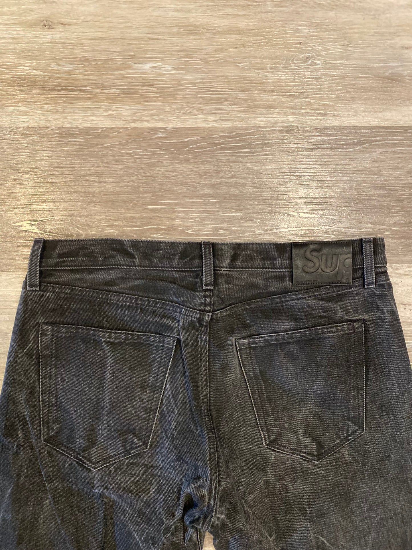 SUPREME STONE WASHED JEANS