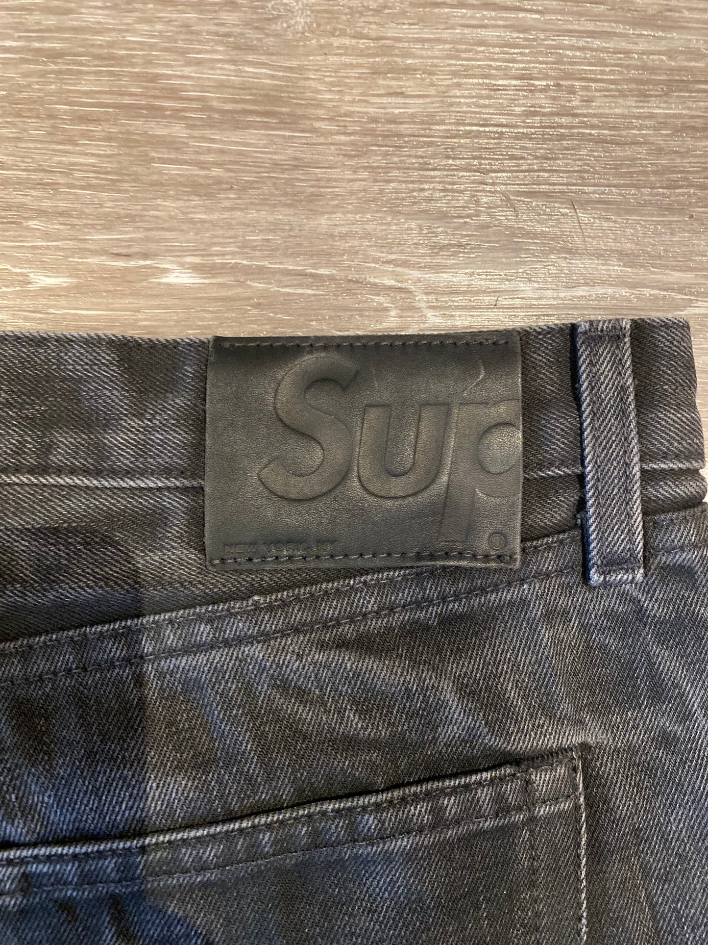 SUPREME STONE WASHED JEANS